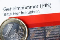PIN-Geheimnummer und Nummernfeld zum neuen deutschen Personalausweis.